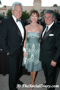 don cohn with denise and bertrand hug